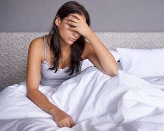 睡眠不足に悩む女性